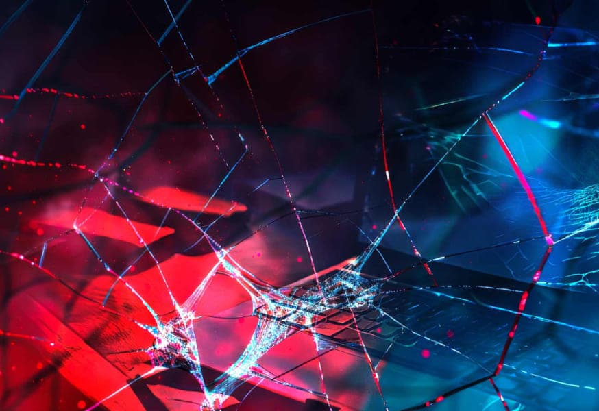 Shattered glass with red and blue light beneath it